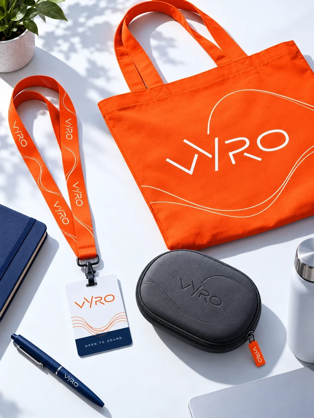 Vyro orange tote, staff badge and black headset case